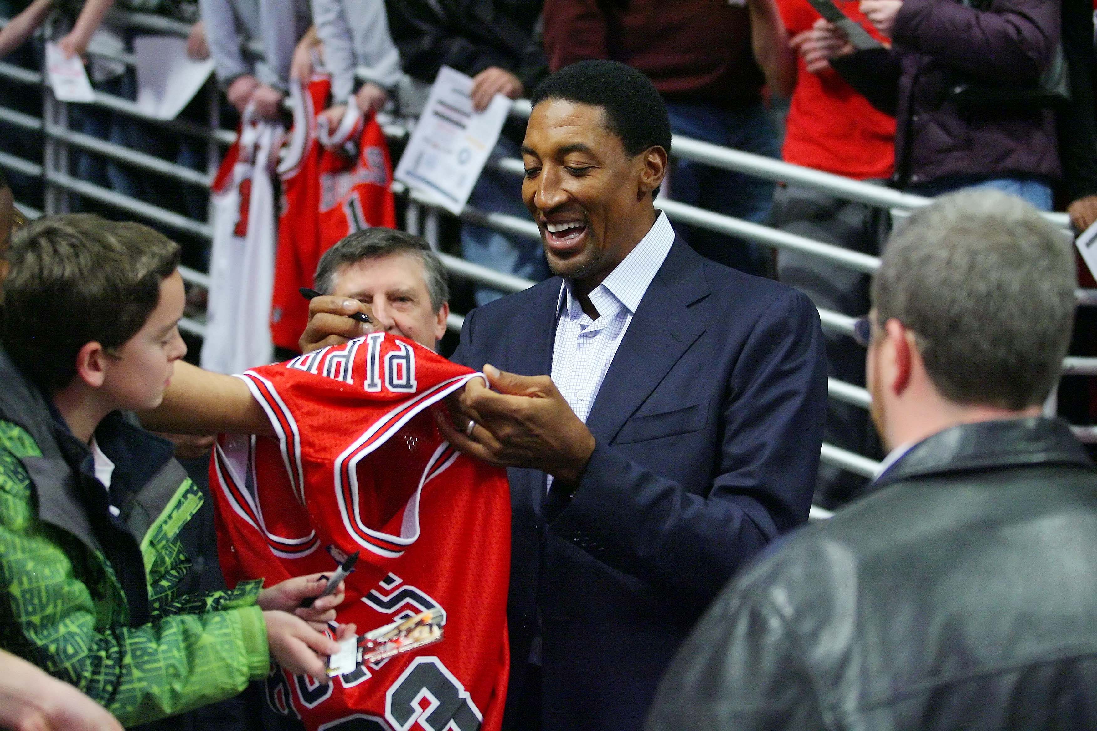 Dec. 18, 2010; Chicago, IL, USA; Chicago Bulls former player Scottie Pippen signs autographs prior to a game against the Los Angeles Clippers at the United Center. Mandatory Credit: Dennis Wierzbicki-Imagn Images - Source: Imagn