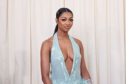 Angel Reese bundling up in faux fur look receives two-word reaction from US gymnast