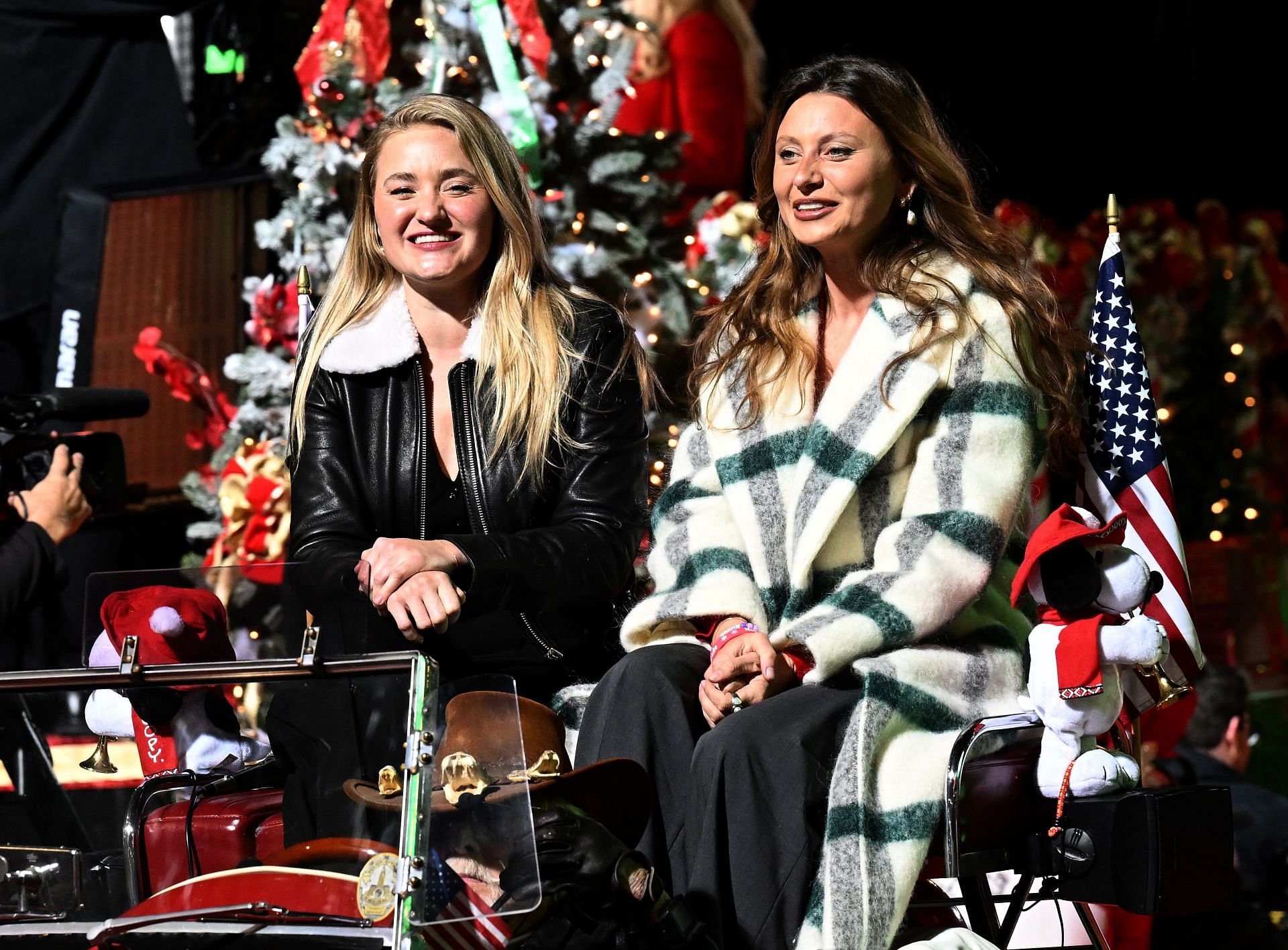 AJ Michalka and Aly Michalka ride in the 91st Hollywood Christmas Parade (Image via Getty)