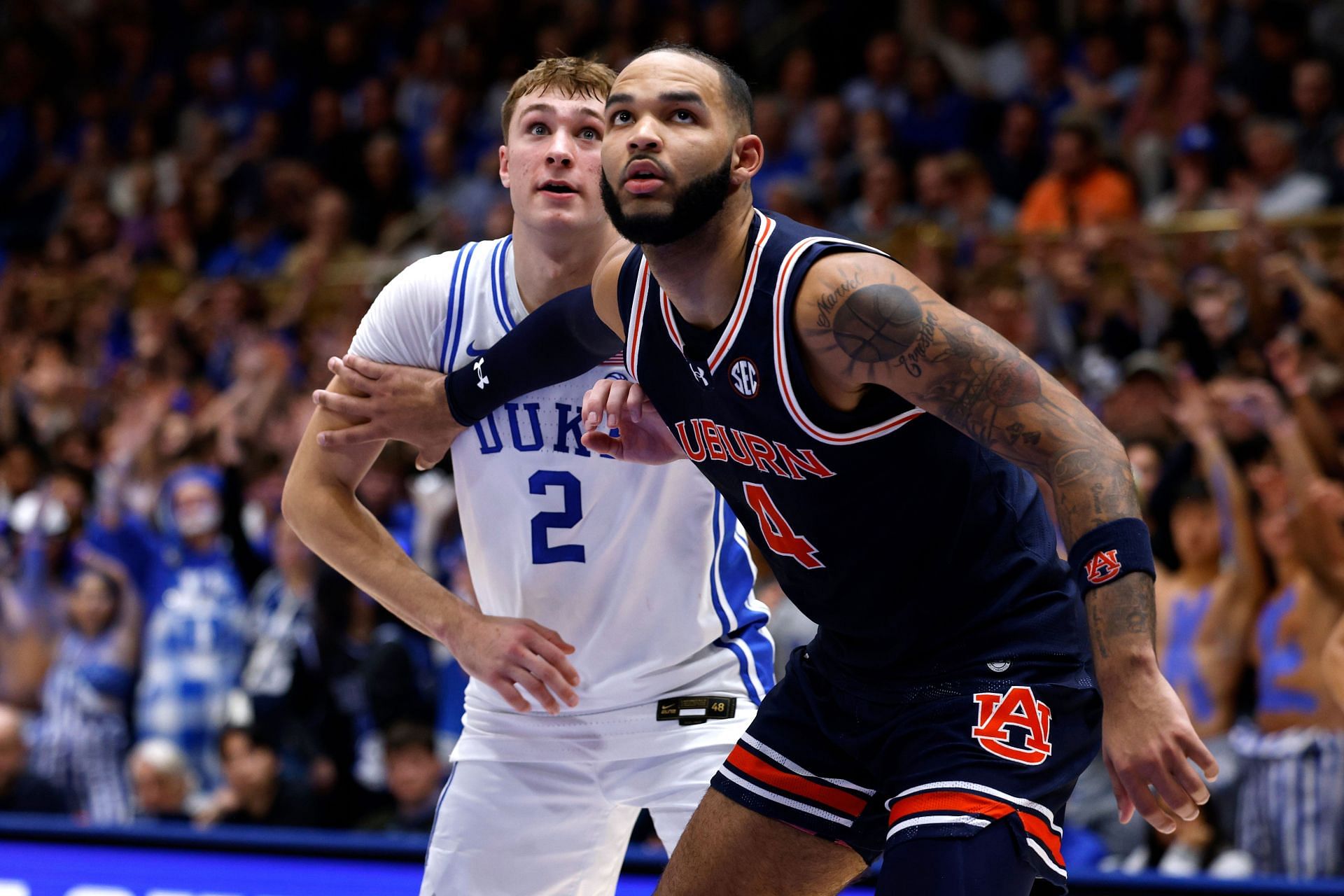 Johni Broome of the Auburn Tigers boxes out against Cooper Flagg of the Duke Blue Devils during the first half of their NCAA game at Cameron Indoor Stadium. Photo: Getty