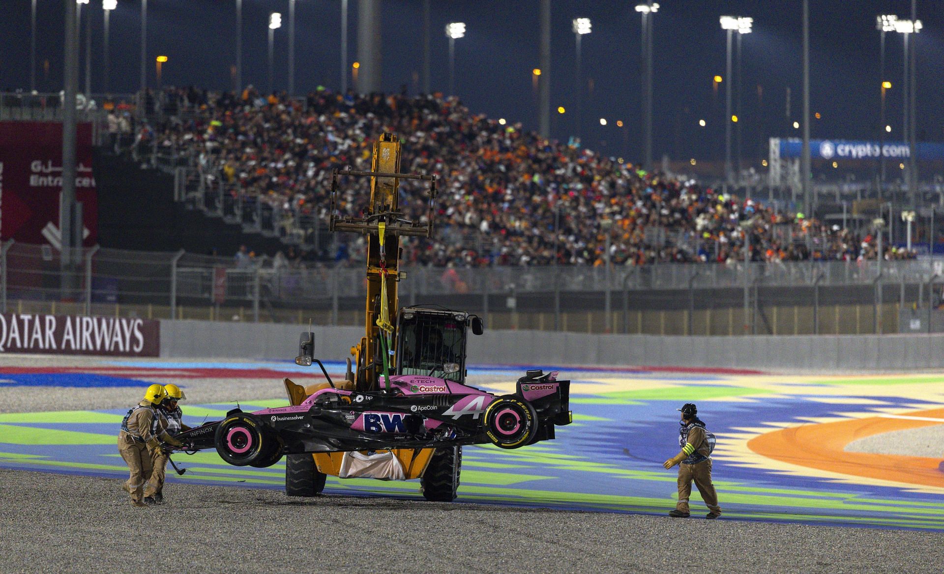 The racing car belonging to Esteban Ocon of Alpine is removed from the race track after a crash during the Formula 1 Qatar Grand Prix - Source: Getty Images