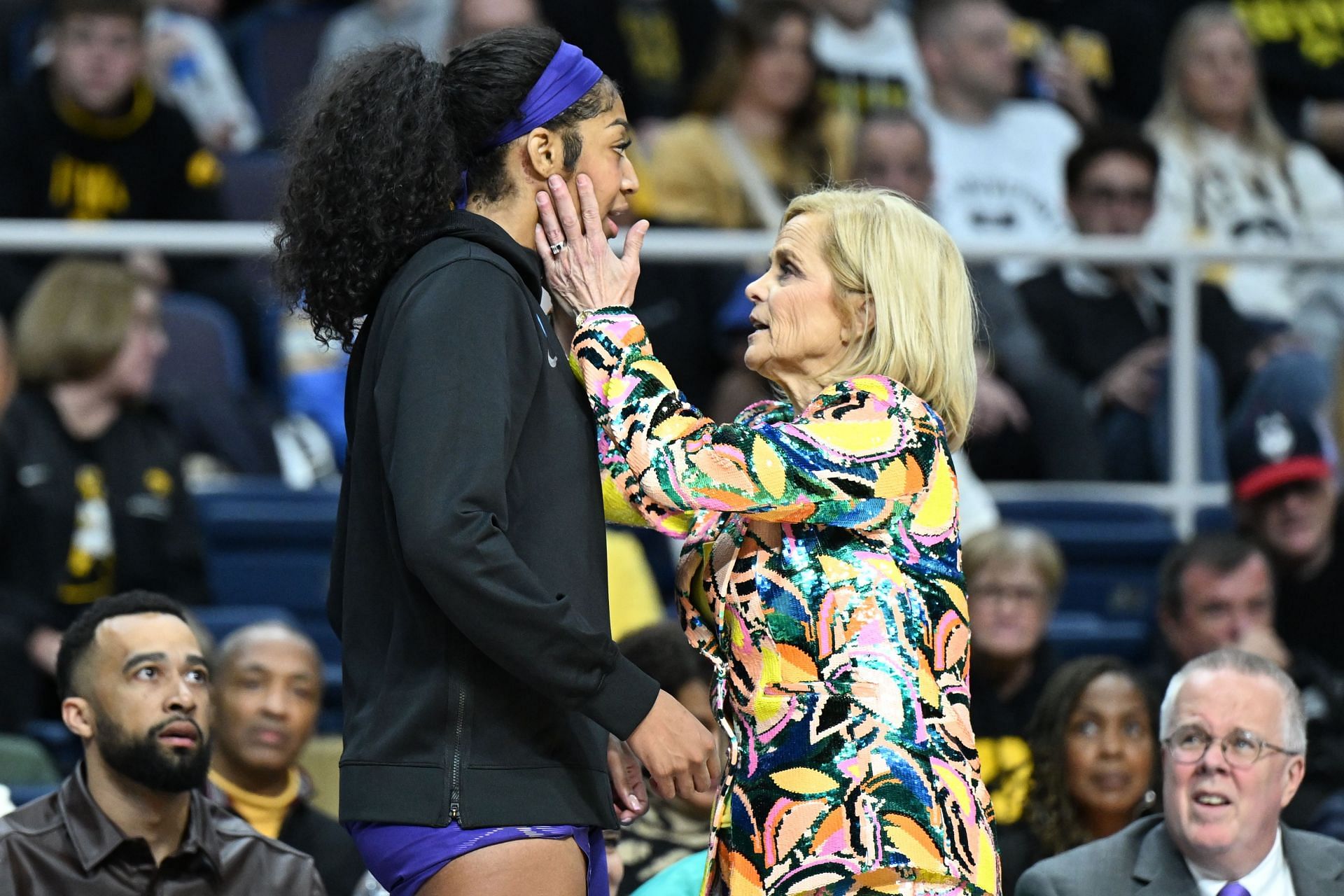 Angel Reese (#10) of the LSU Tigers speaks with head coach Kim Mulkey on the sidelines during their Sweet Sixteen game against the UCLA Bruins on March 30, 2024 in Albany, New York. Photo: Getty