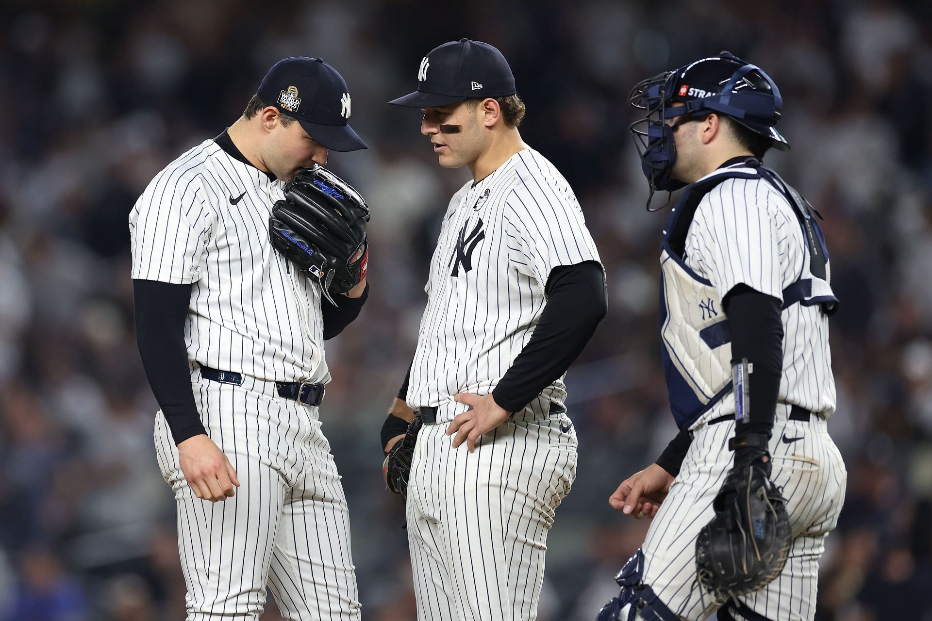 Tommy Kahnle visited on the mound by Anthony Rizzo and Austin Wells in game five of the World Series against the Los Angeles Dodgers - Source: Getty