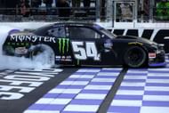 Ty Gibbs, driver of the #54 Monster Energy Toyota, celebrates with a burnout after winning the NASCAR Xfinity Series Dead On Tools 250 - Source: Getty Images