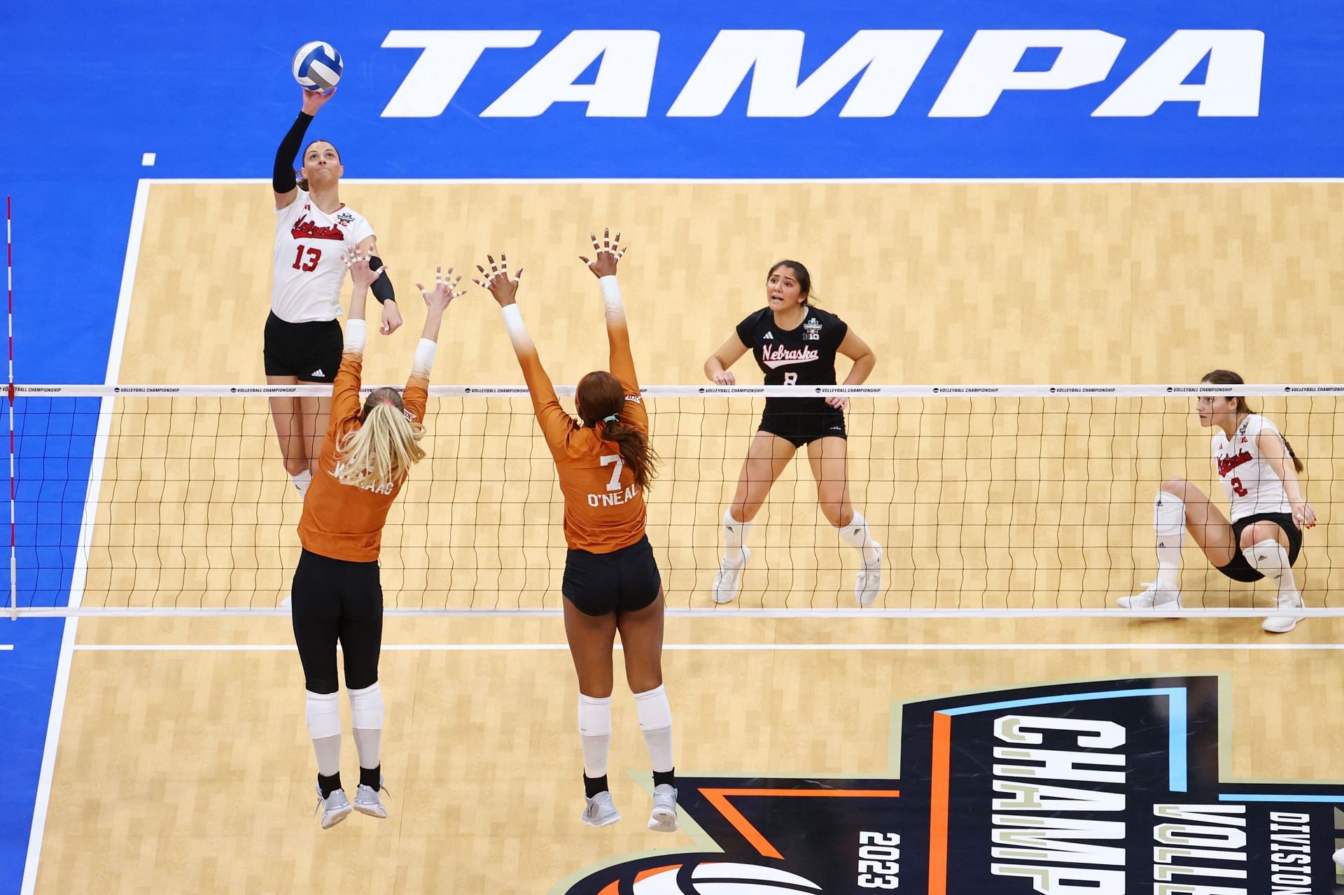 Merritt Beason donning the jersey no.13 on the left during the 2023 NCAA Division 1 Volleyball Championships (Image via: Getty Images)