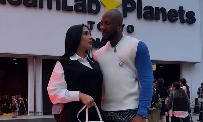 In Photos: Starling Marte's wife Elianny turns up the glamour in tube-style bodycon black dress paired with sleek knee-high boots