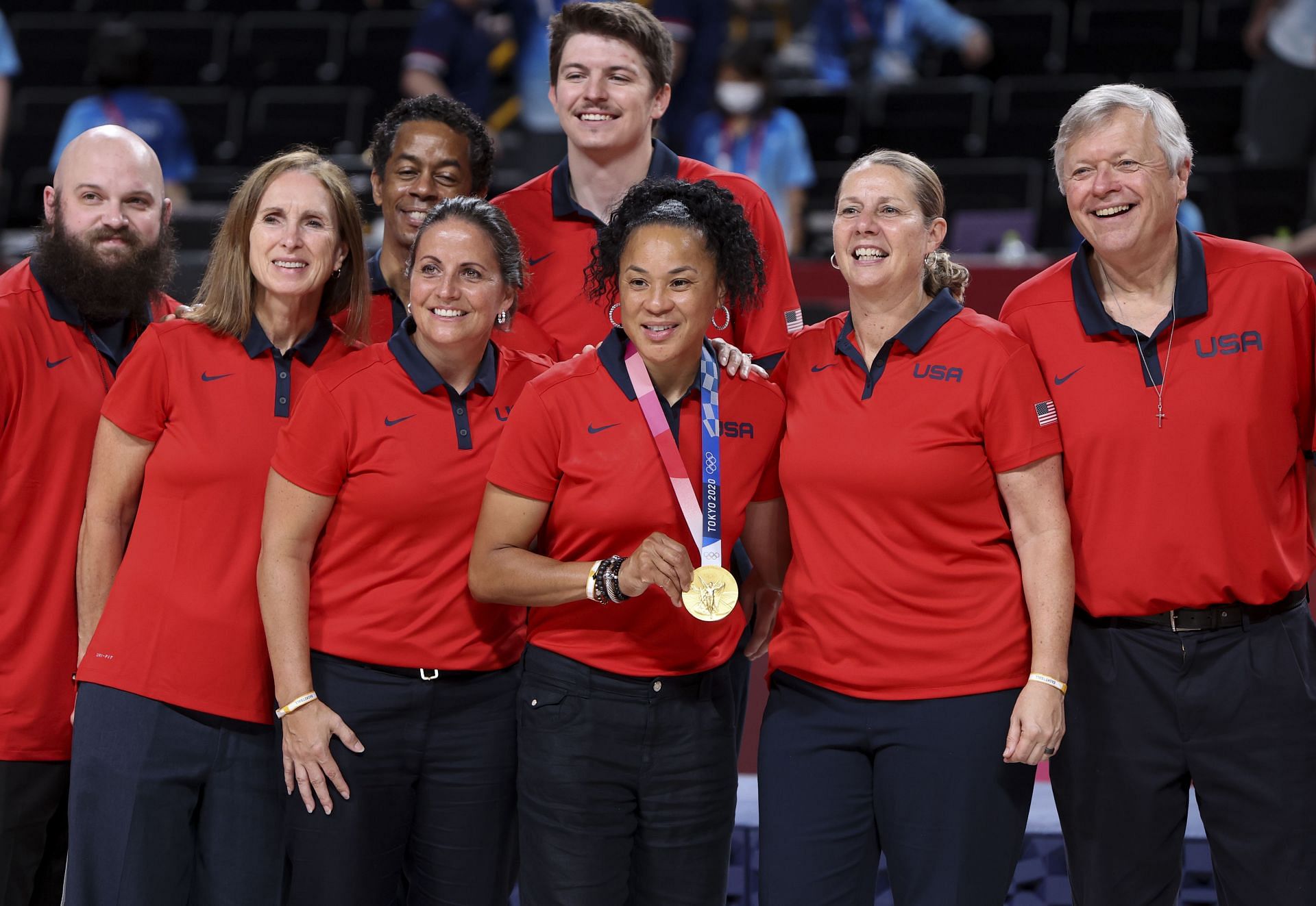 Dawn Staley celebrates Olympic Gold Medal with her coaching staff in 2020 (2021) [Basketball - Olympics: Day 16 - Source: Getty]