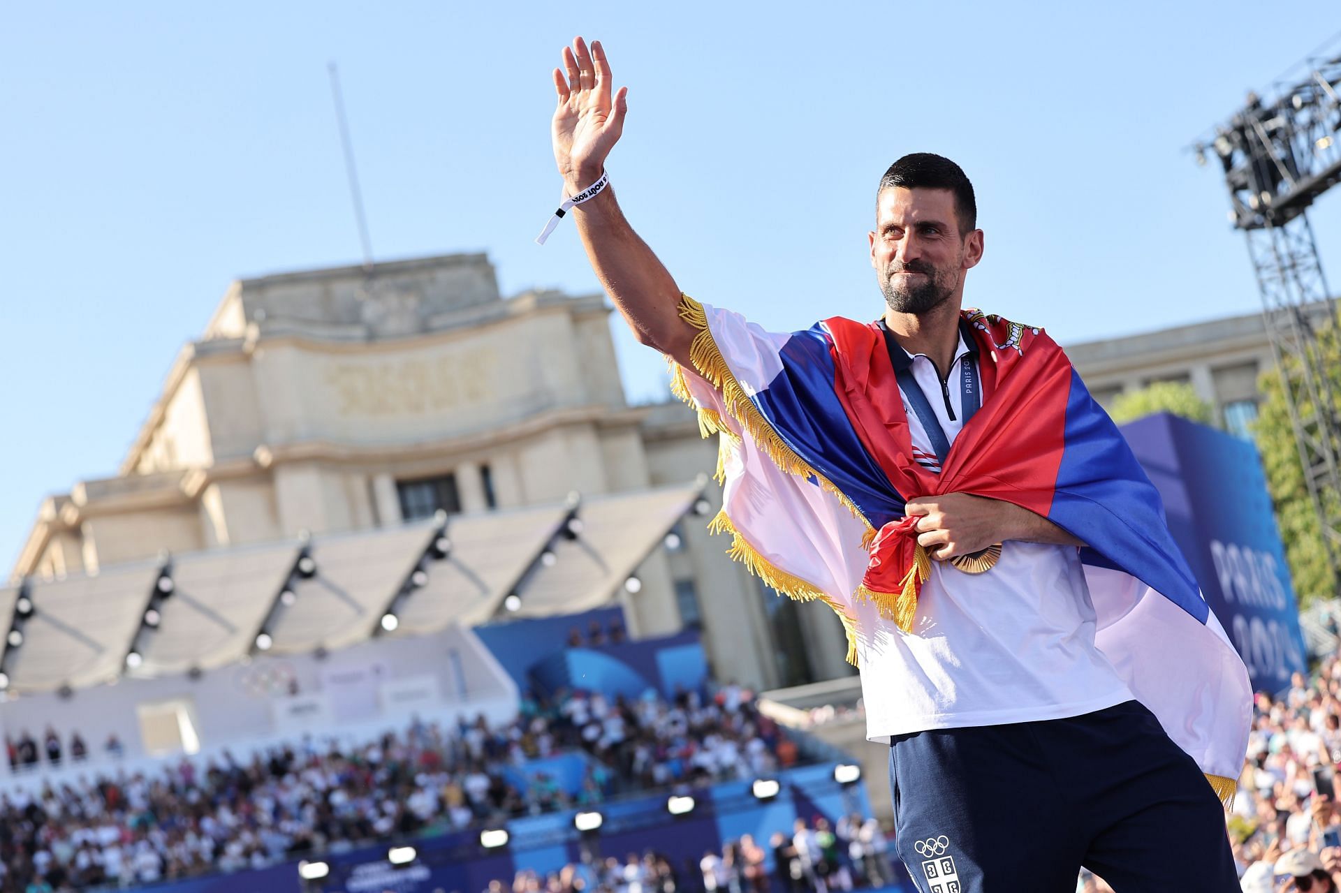 Men&#039;s Tennis Singles gold medalist Novak Djokovic waves to fans at the 2024 Paris Olympics  - Source: Getty