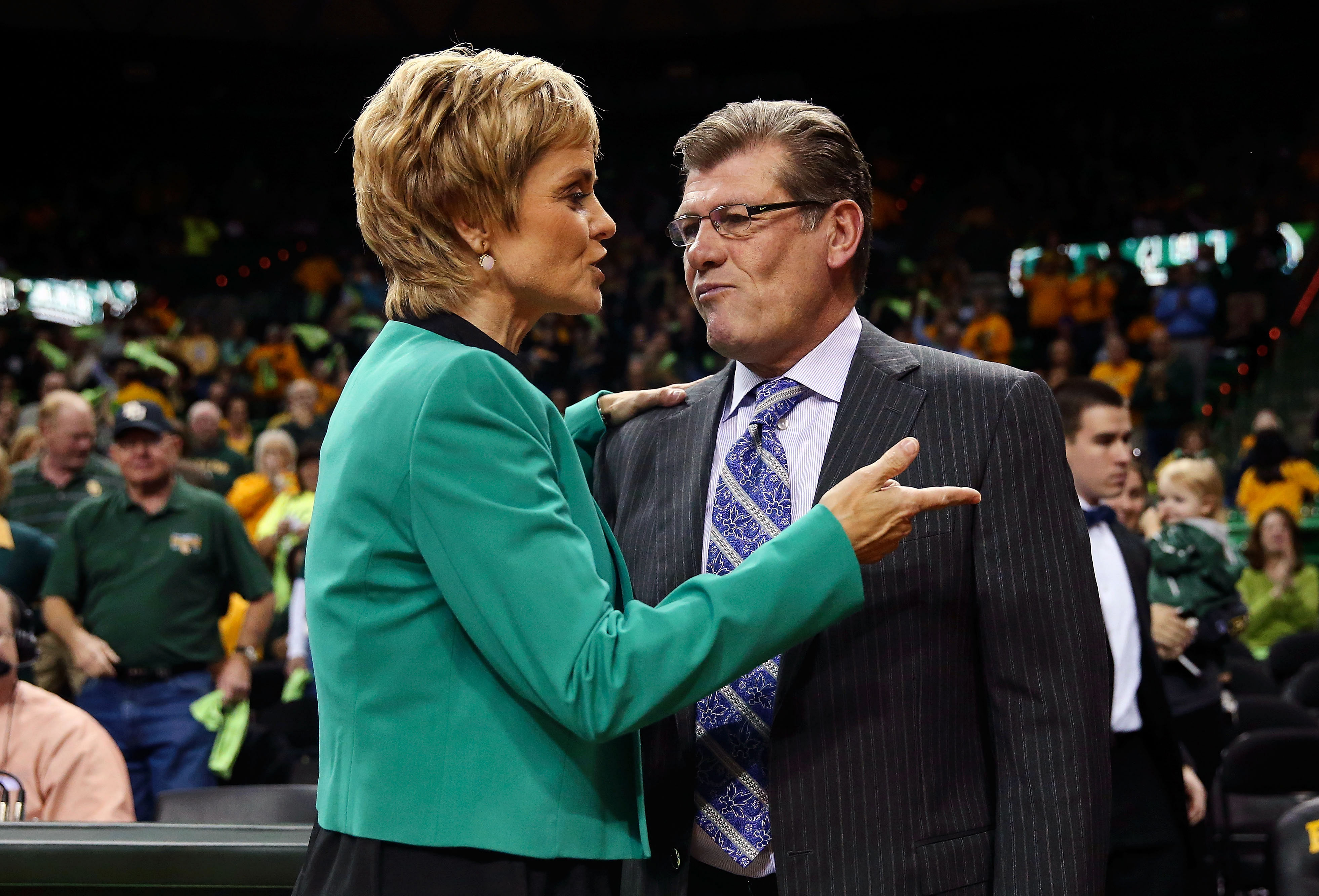 Jan 13, 2014; Waco, TX, USA; Geno Auriemma and Kim Mulkey speak before the game between the Connecticut Huskies and the Baylor Bears at the Ferrell Center on Jan. 13, 2014 (Credits: IMAGN)