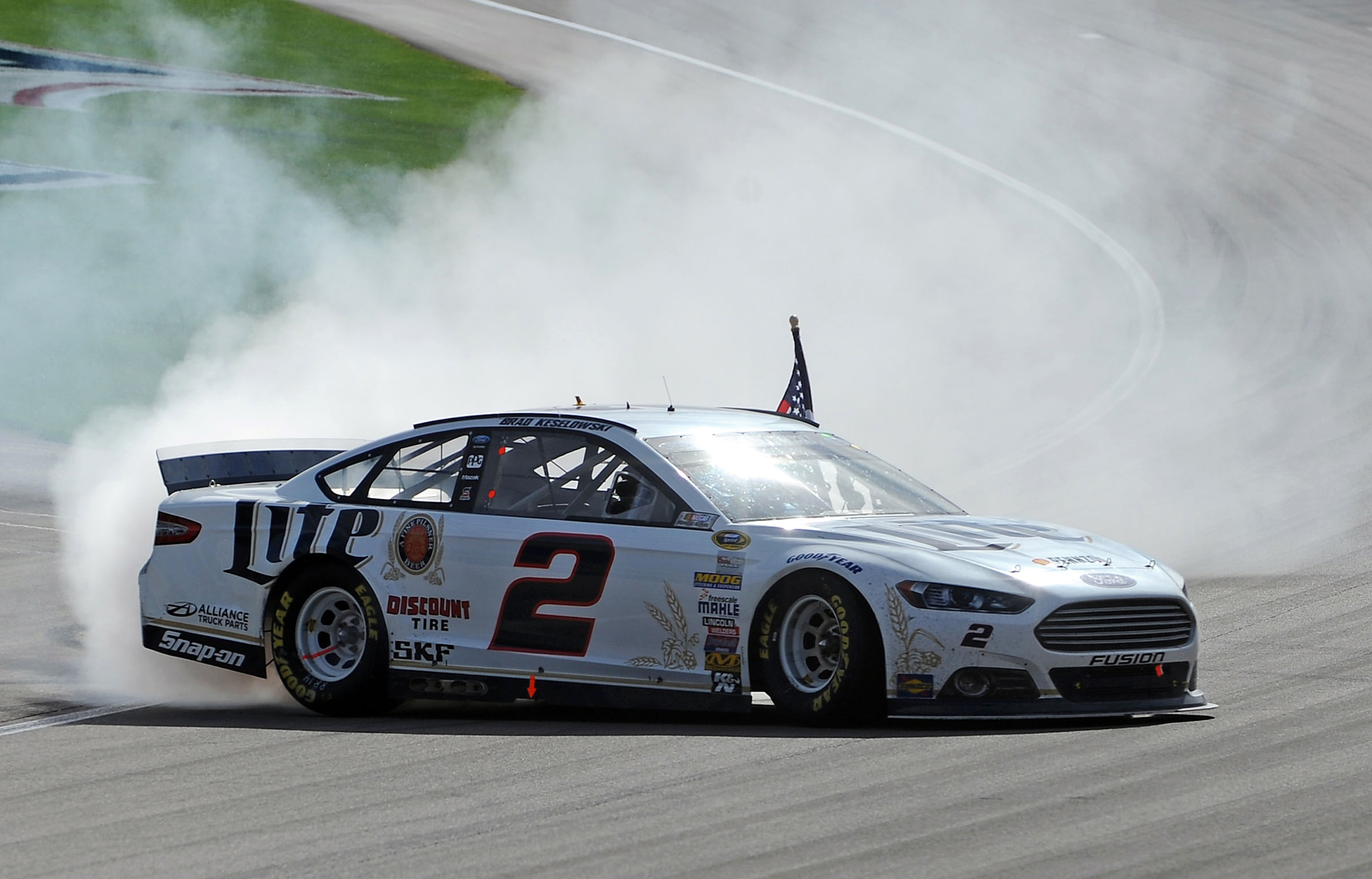  Brad Keselowski spins out in celebration after winning the Kobalt Tools 400 at Las Vegas Motor Speedway. - Source: Imagn