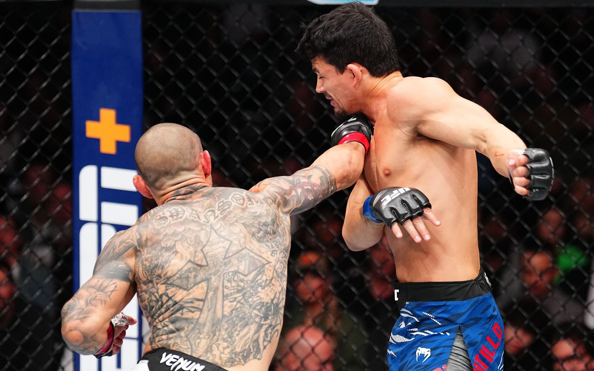 Cub Swanson (left) scored a tremendous knockout against Billy Quarantillo (right) at UFC Tampa [Image courtesy: Getty Images]