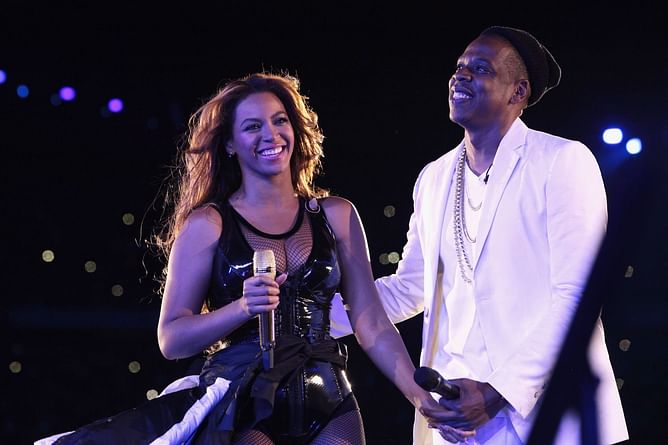 Ex-NFL star Larry Johnson claims seeing children walk into Jay-Z and Beyonce's rap party in Colorado at 11 pm