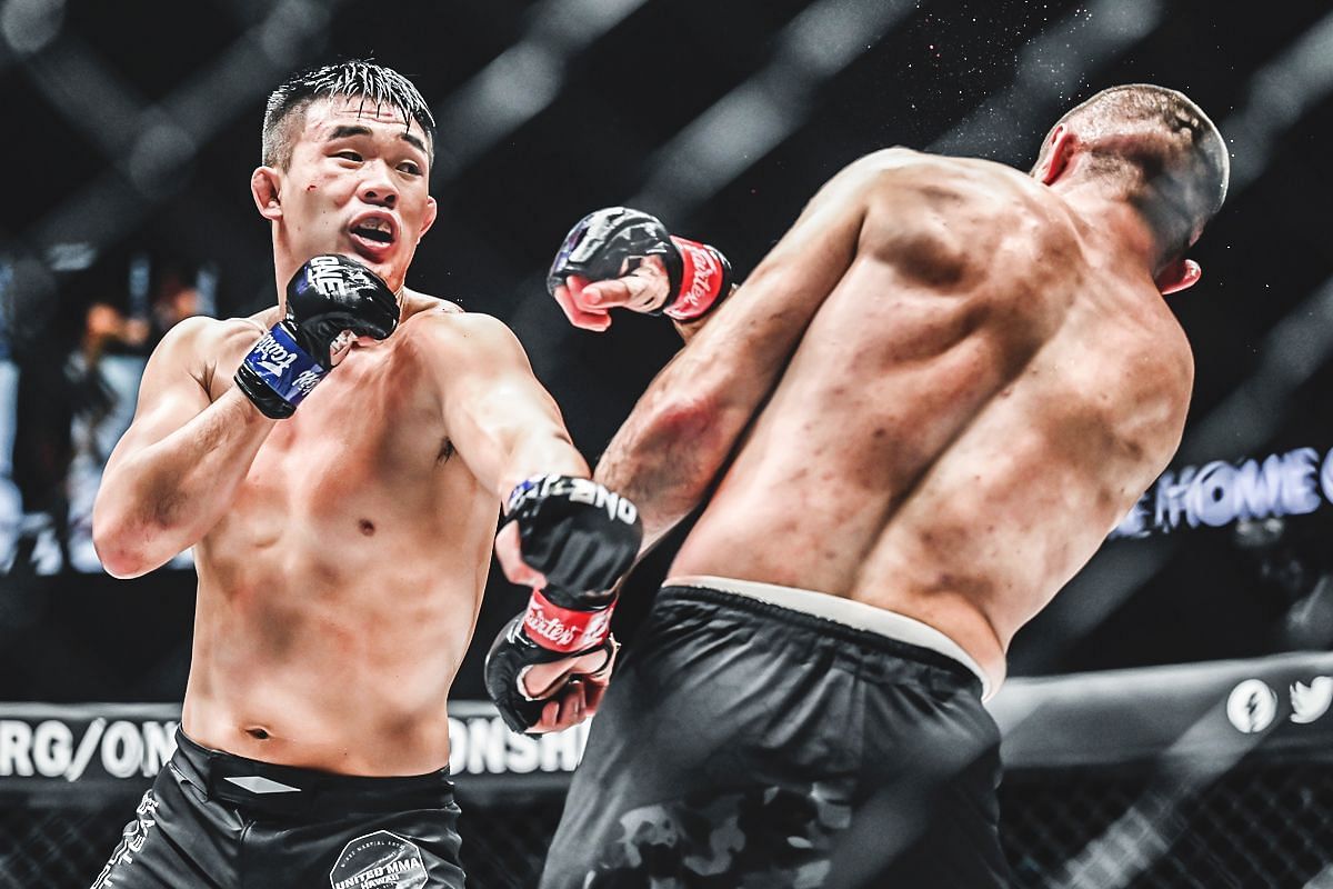 FREE FULL FIGHT: Christian Lee ascends to double-champ status in heroic comeback against Kiamrian Abbasov in Singapore -- Photo by ONE Championship