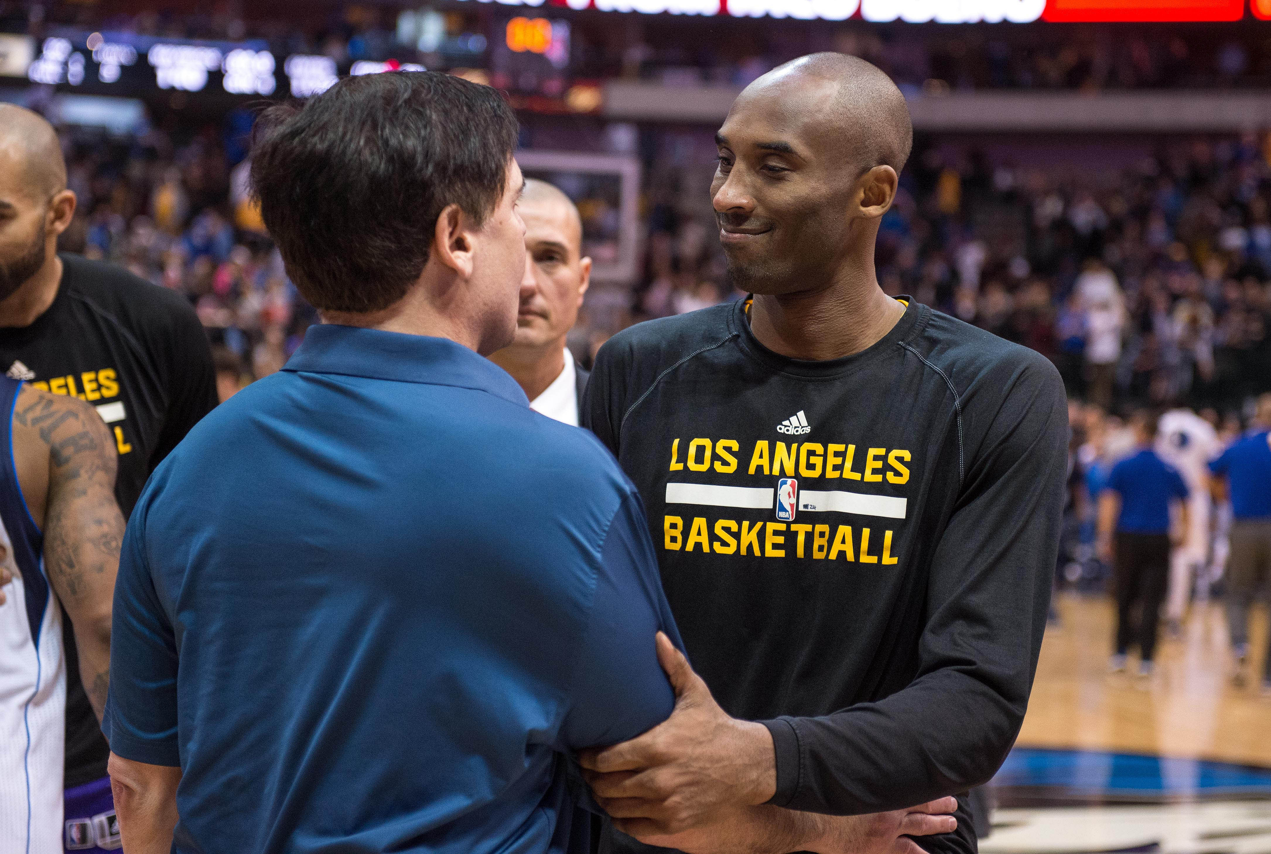 Angeles Lakers guard Kobe Bryant greets Dallas Mavericks owner Mark Cuban after a game at the American Airlines Center. Photo Credit: Imagn