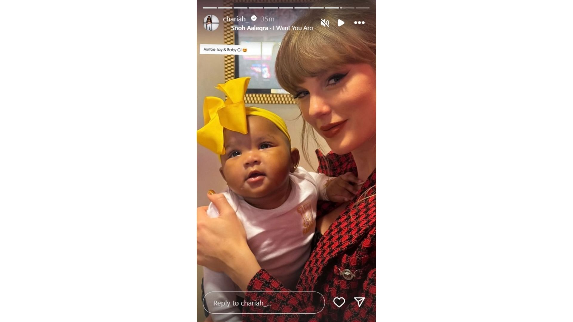 Mecole Hardman Jr's fiancee Chariah Gordon shares adorable snap of daughter Ci and Taylor Swift (via @chariah_/IG)