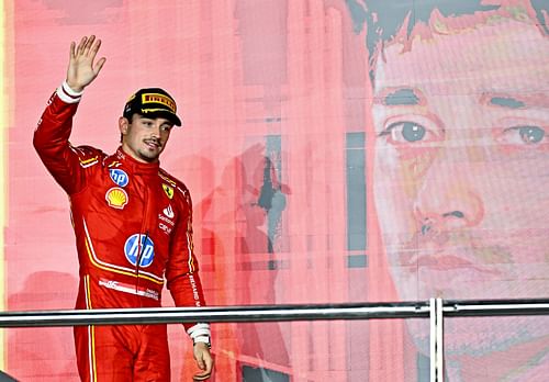 Formula One driver Charles Leclerc of Ferrari, celebrates on the podium - Source: Getty Images