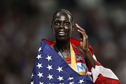 Athing Mu reacts to her mural art featuring her Tokyo Olympic gold medals in her hometown in New Jersey