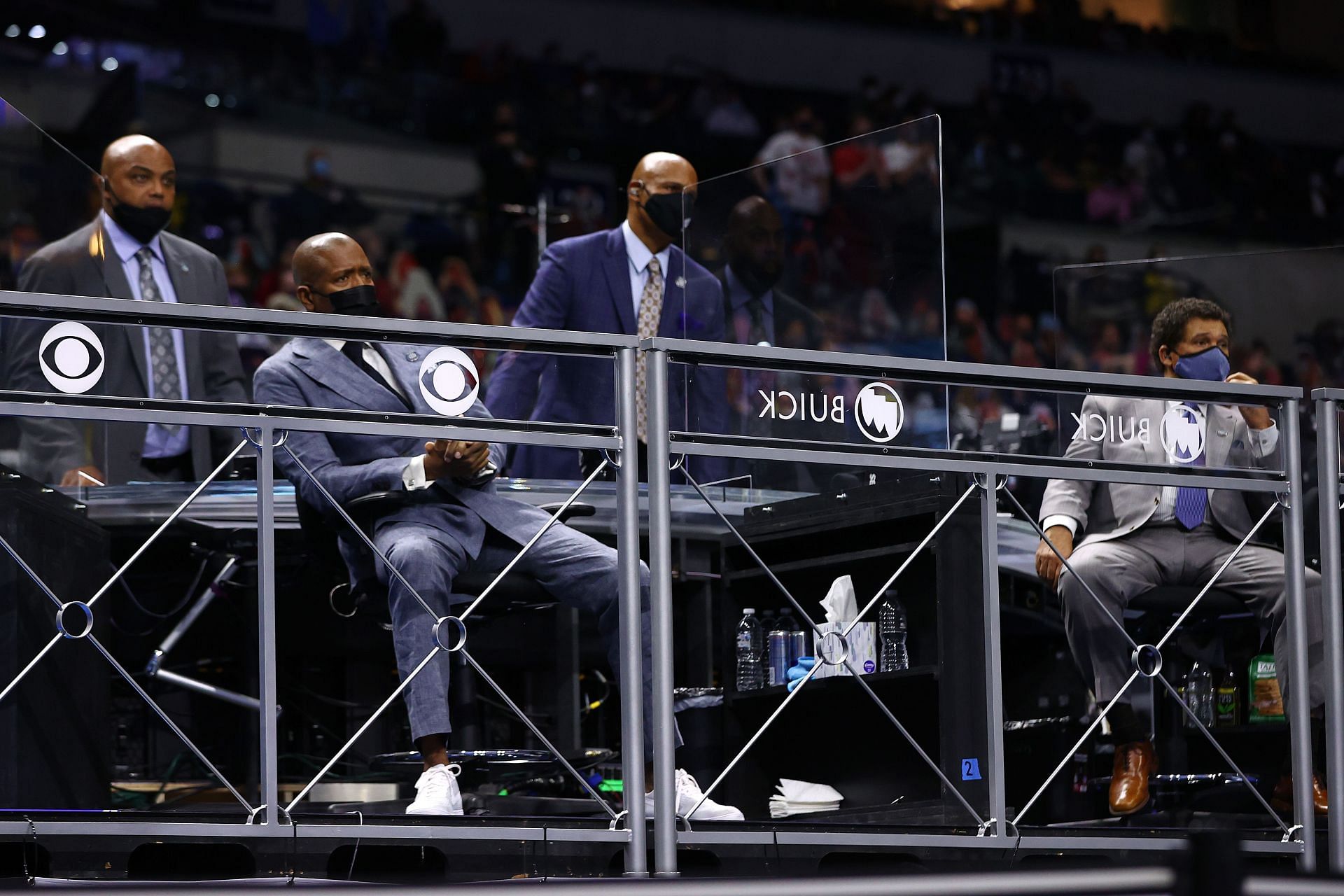 Charles Barkley, Kenny Smith, Clark Kellogg and Greg Gumbel watch the game between the Gonzaga Bulldogs and the UCLA Bruins in the Final Four semifinal game of the 2021 NCAA Men&#039;s Basketball Tournament at Lucas Oil Stadium on April 03, 2021, in Indianapolis, Indiana. (Image Source: Getty)