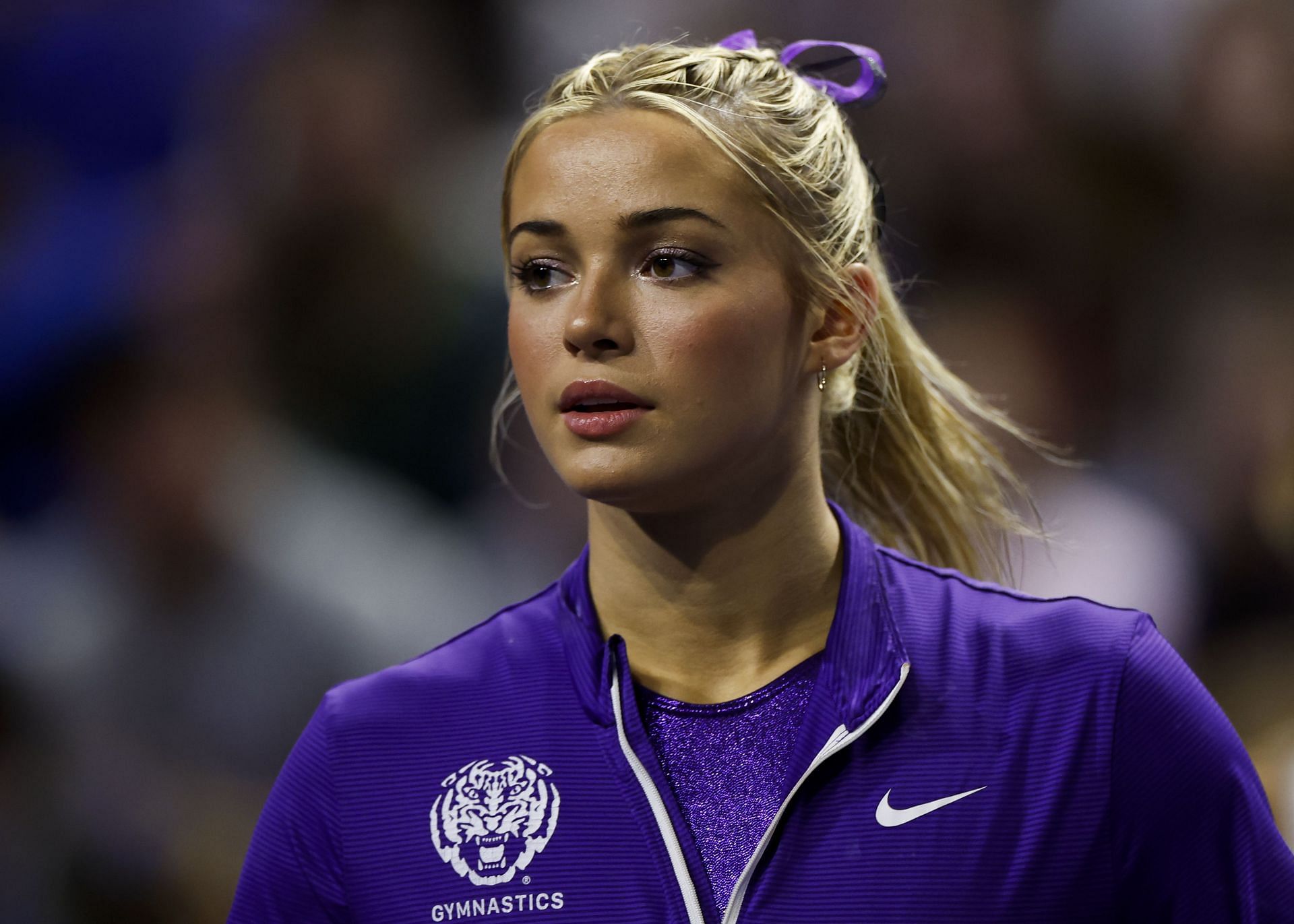 Olivia Dunne in between the competition between LSU and Florida at the NCAA Championships - (Source: Getty)