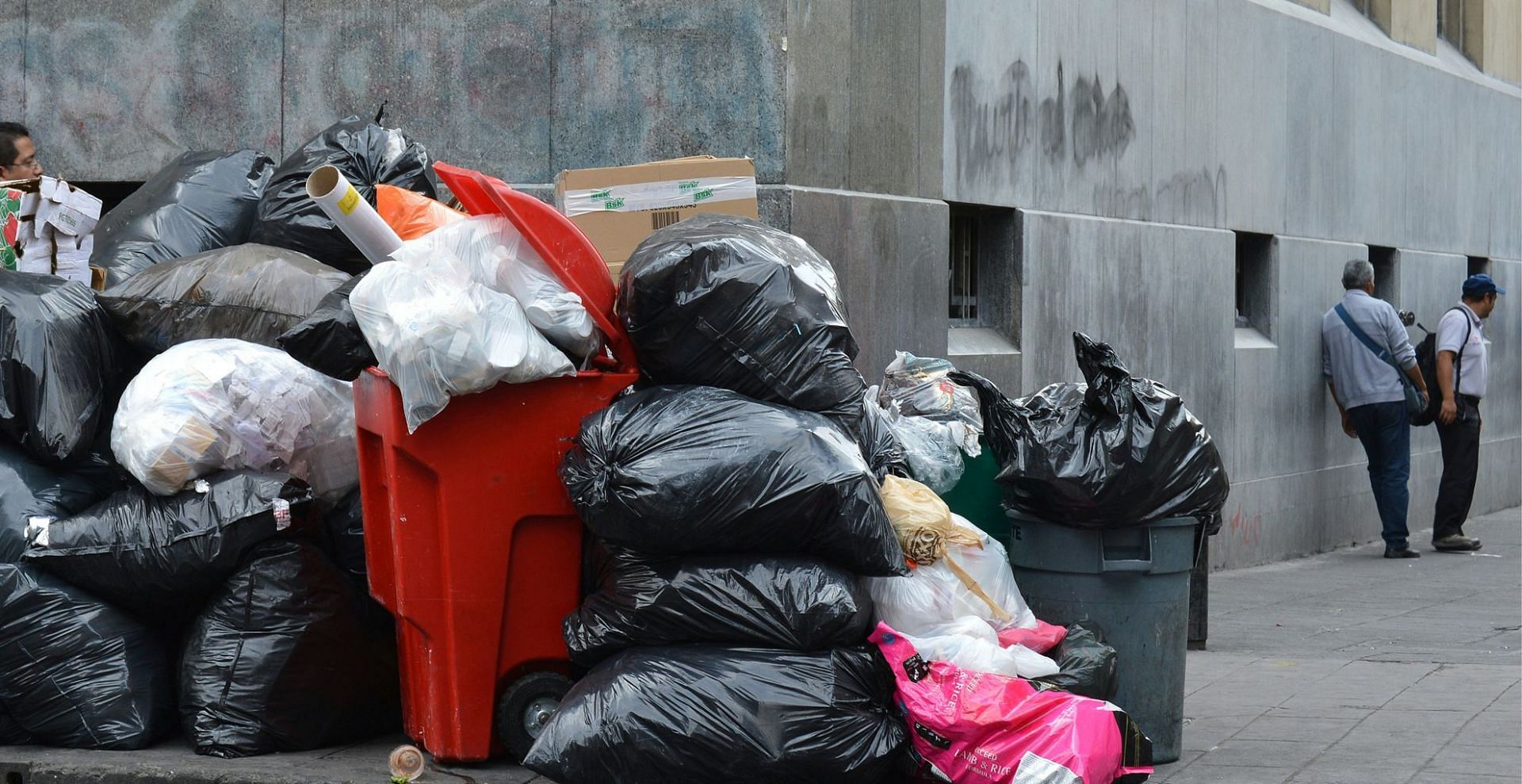 The dumpster and missing trash bags (Image via Unsplash)