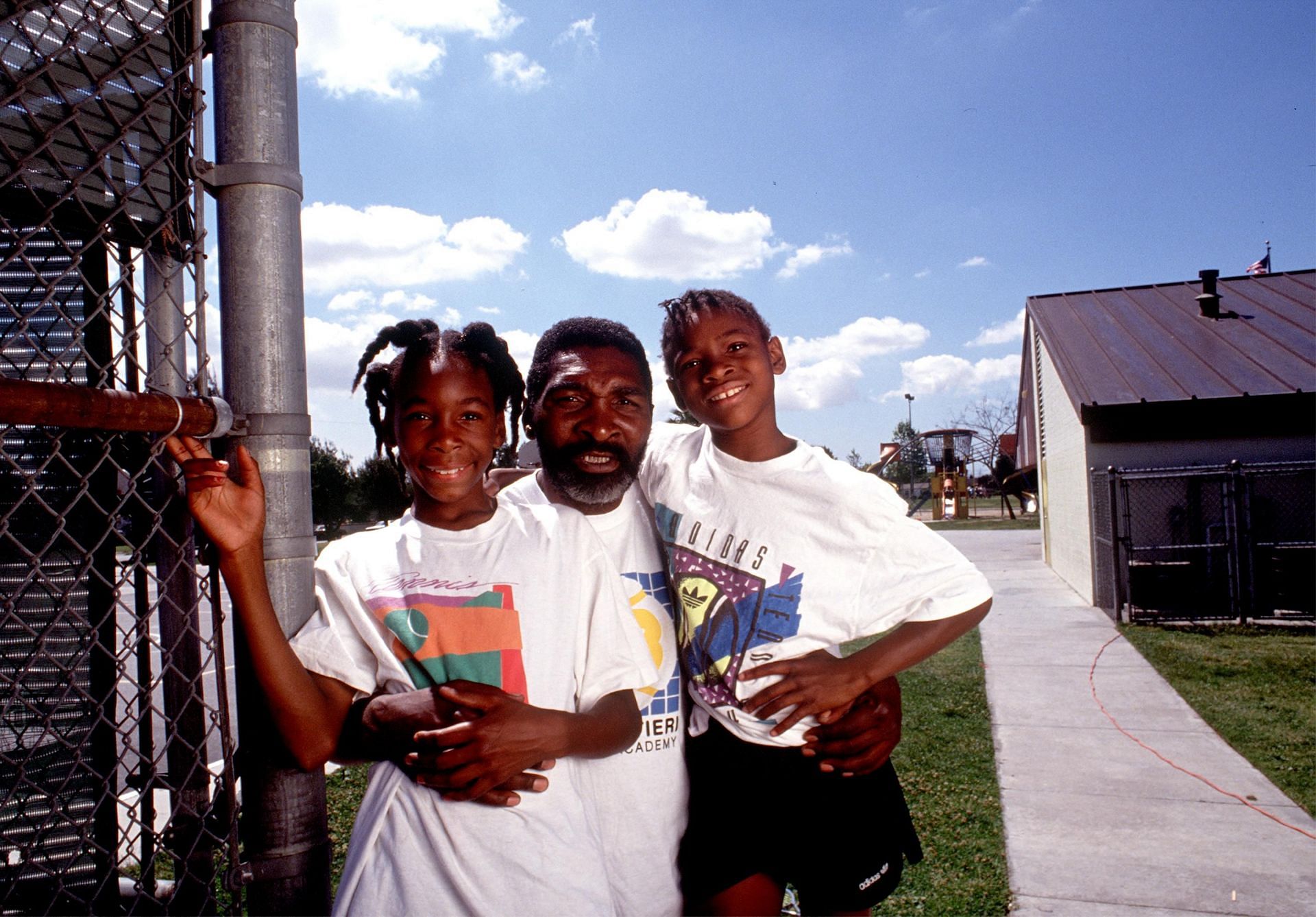 Venus, Richard, and Serena Williams pose in 1991 in Compton (Source: Getty)