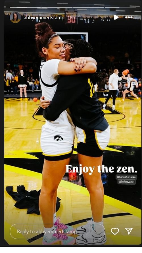 Iowa players Jada Gyamfi and Hannah Stuelke hug each other after the win over Purdue. IG image via @abbyemertstamp