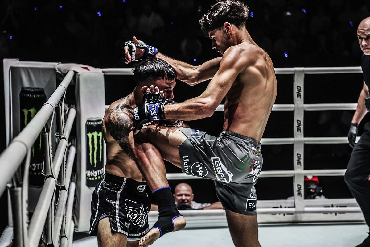 Elias Mahmoudi (R) knees Denis Puric | Photo credit: ONE Championship