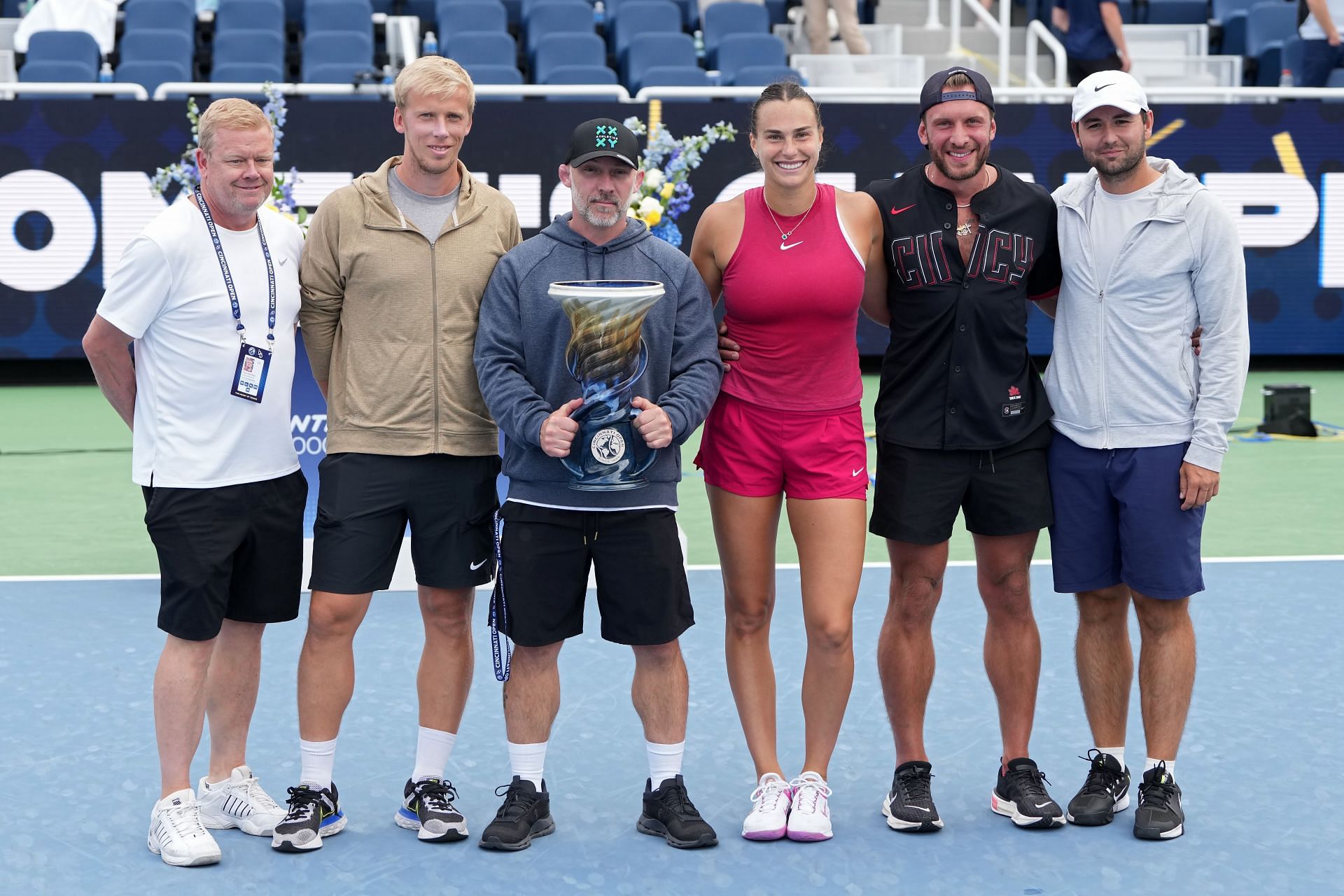 Sabalenka's fitness coach Jason Stacy (third from left) pictured wearing XX-XY hat at Cincinnati Open 2024 - Source: Getty