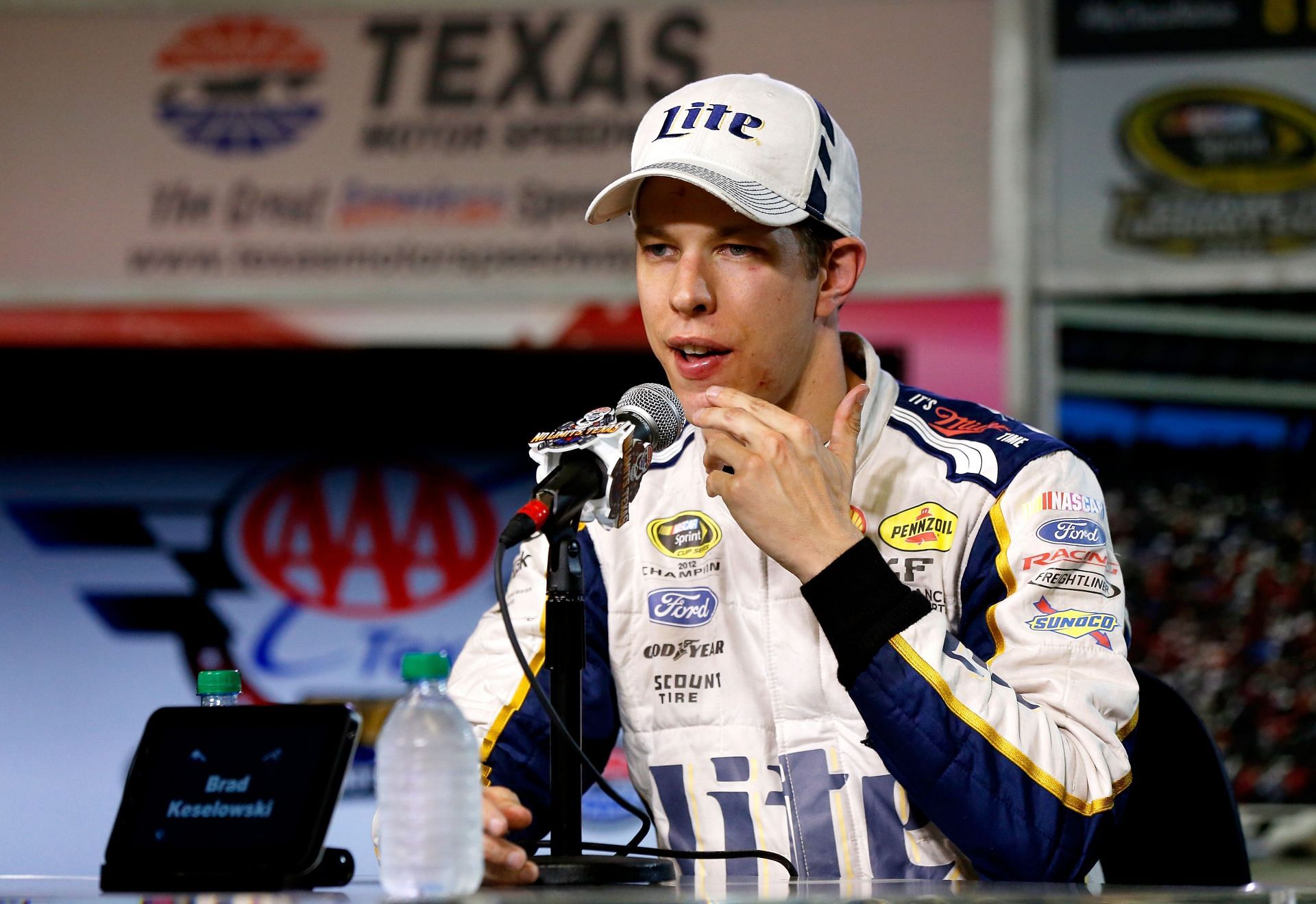  Brad Keselowski speaks to the media after being involved in the fight with Jeff Gordon at the Texas 500 - Source: Getty