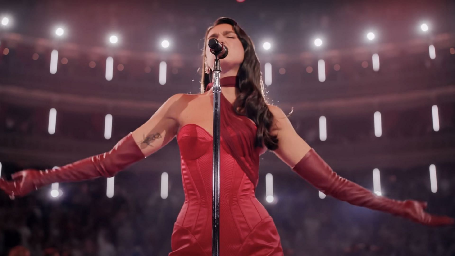 Dua Lipa performing in the Royal Albert Hall (Image via Youtube/Dua Lipa)