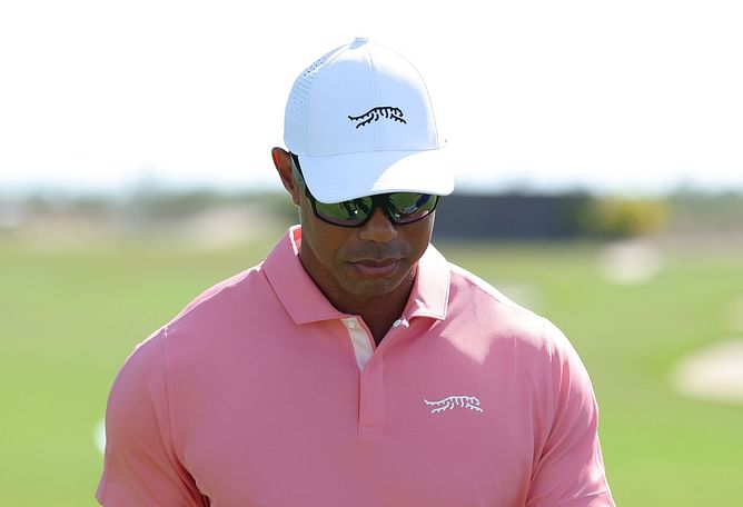 Tiger Woods’ latest pictures show tape on fingers in photoshoot for Sun Day Red’s $250 golf shoes