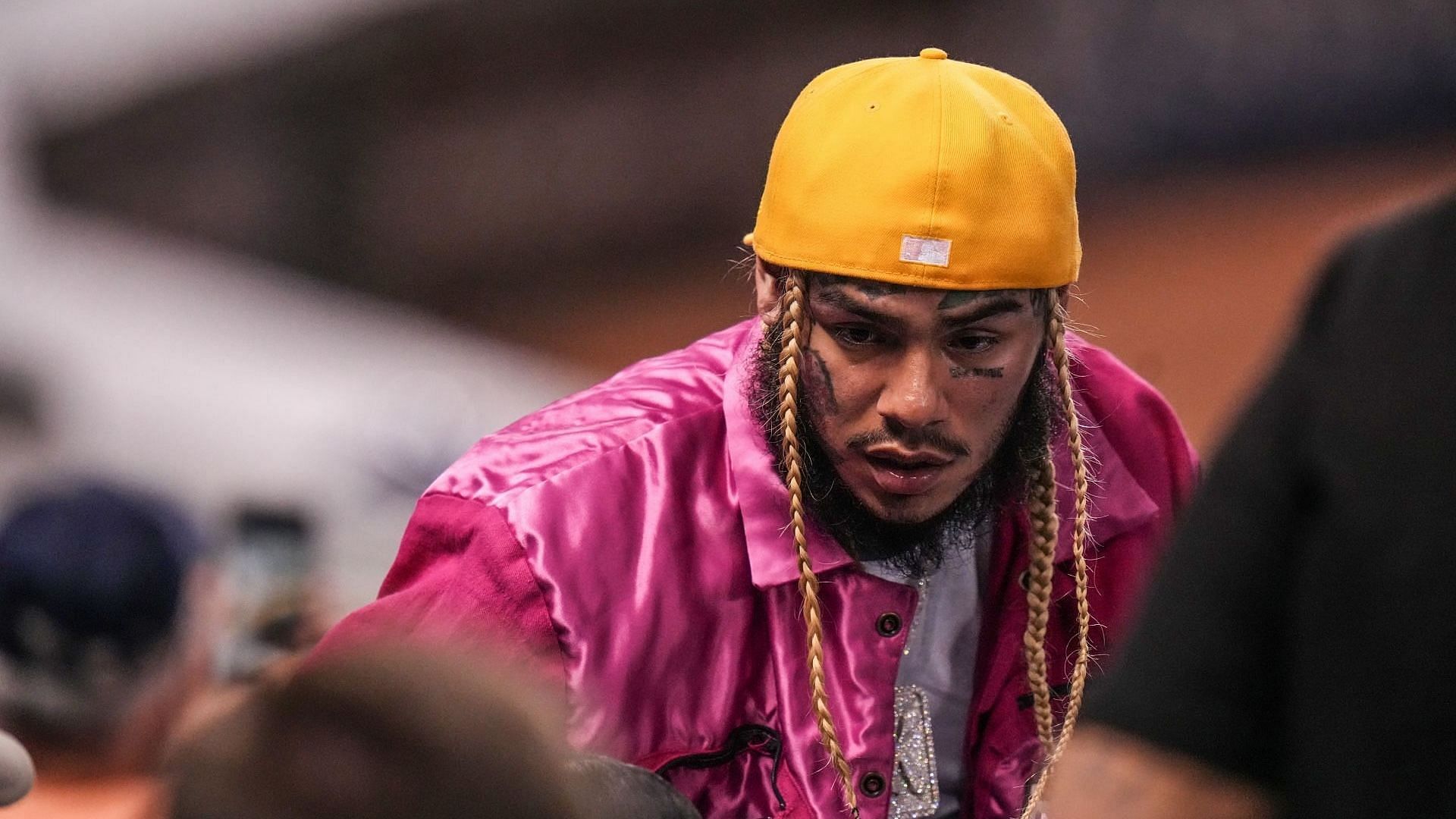 Rapper Tekashi 6ix9ine attends the game between the Miami Marlins and the New York Mets at loanDepot Park on September 08, 2021, in Miami, Florida. (Image via Getty/Mark Brown)