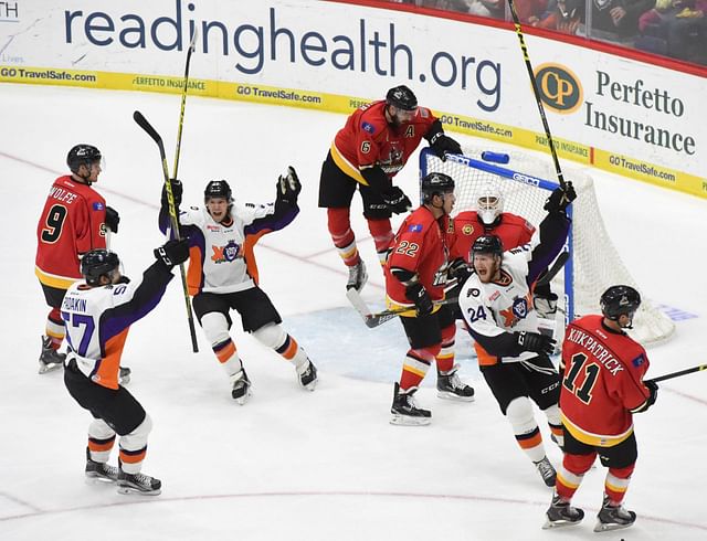 Reading forward Pavel Padakin (57), Reading forward Matt Hatch (21) and Reading forward Scott Tanski (24) celebrate the first of five goals.HOCK The Reading Royals shutout the Adirondack Thunder 5-0 at the Santander Arena.  HOCK - Reading Royals - Source: Getty