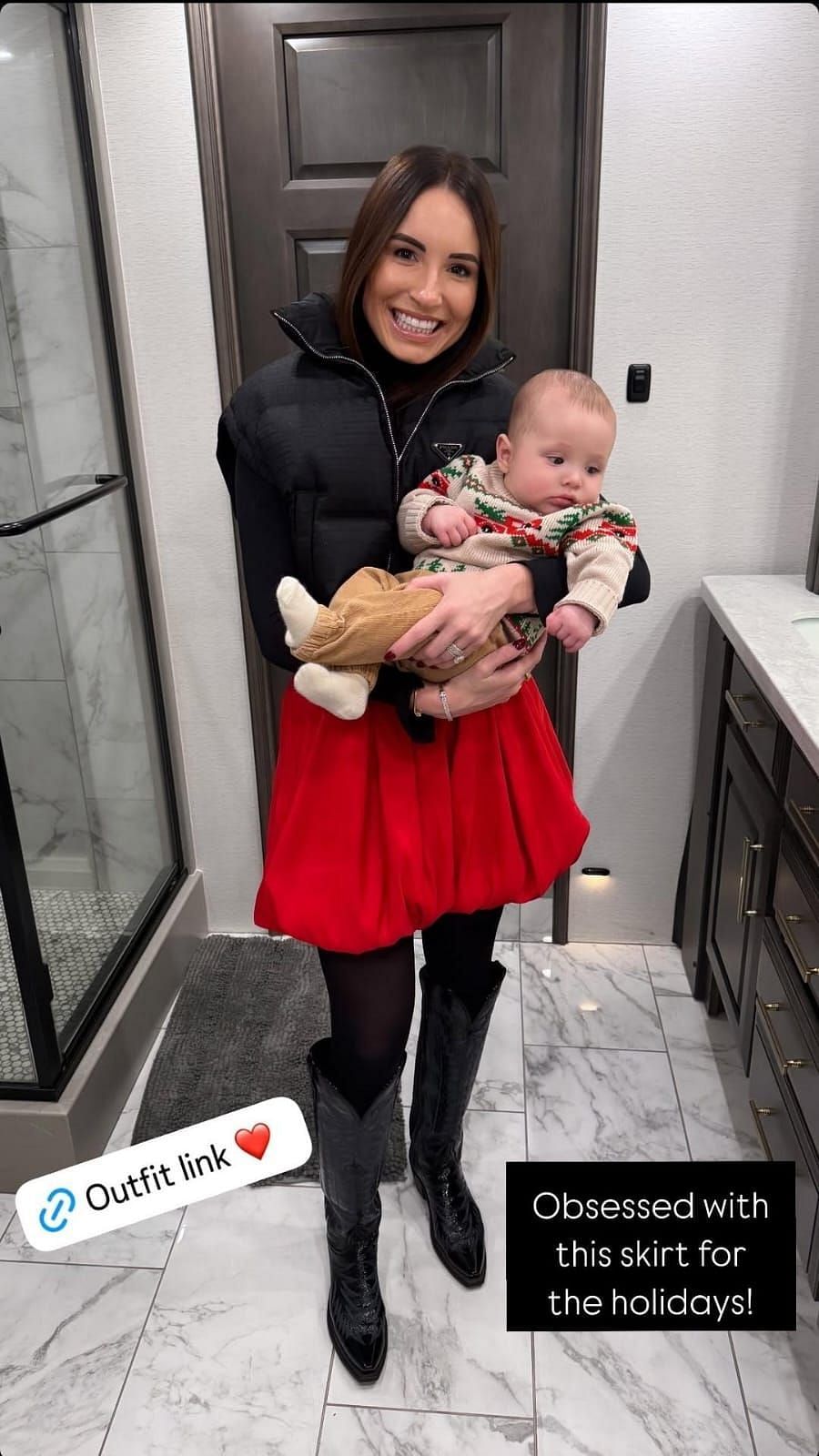 Madyson Joye holding her son and showcasing her obsession with her skirt (Source: @madysonjoye via Instagram)