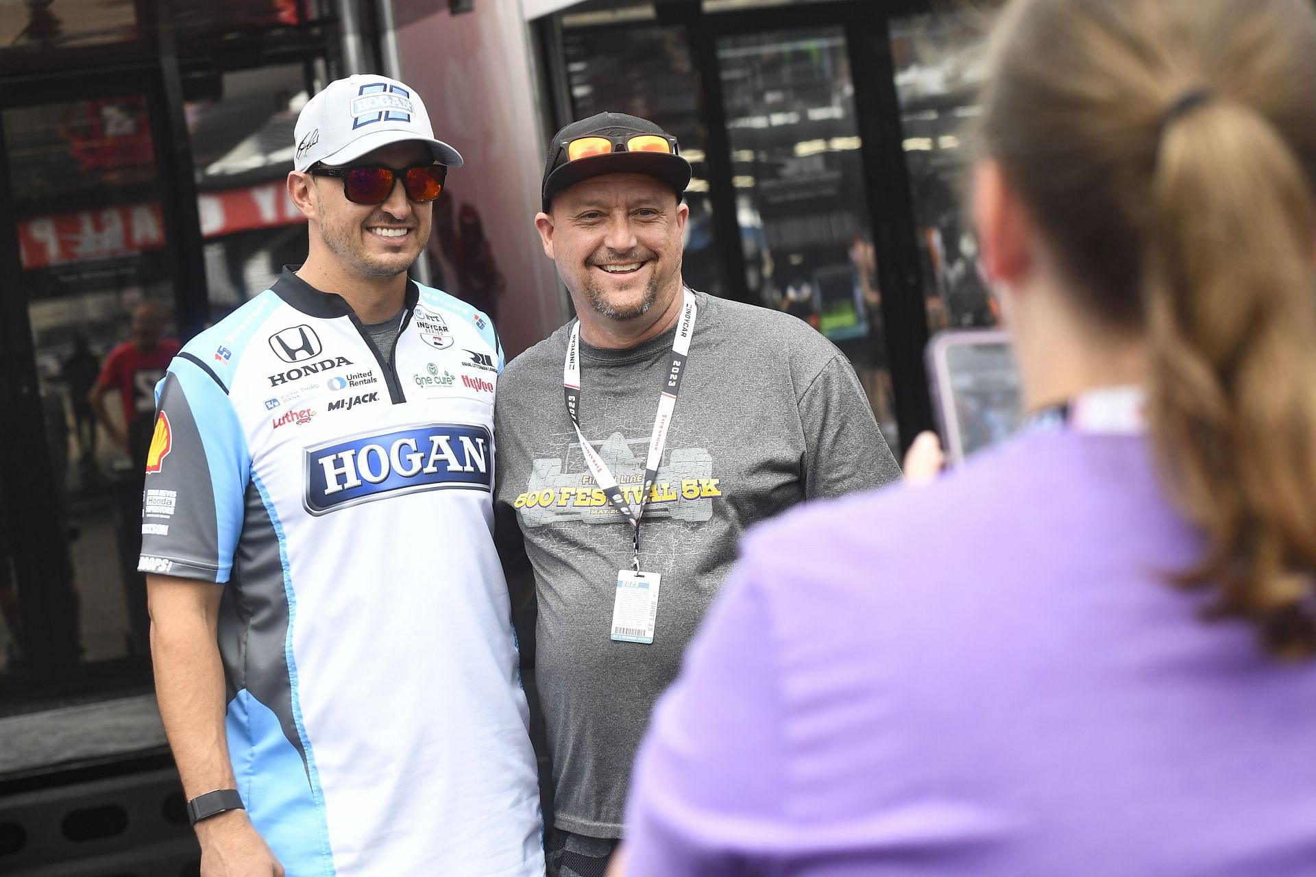 Graham Rahal poses with a fan at the INDYCAR Bommarito Automotive Group 500 (Source: Getty)