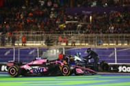 Esteban Ocon of France and Alpine F1 and Franco Colapinto of Argentina and Williams climb out of their cars after crashing at the start during the F1 Grand Prix of Qatar - Source: Getty Images
