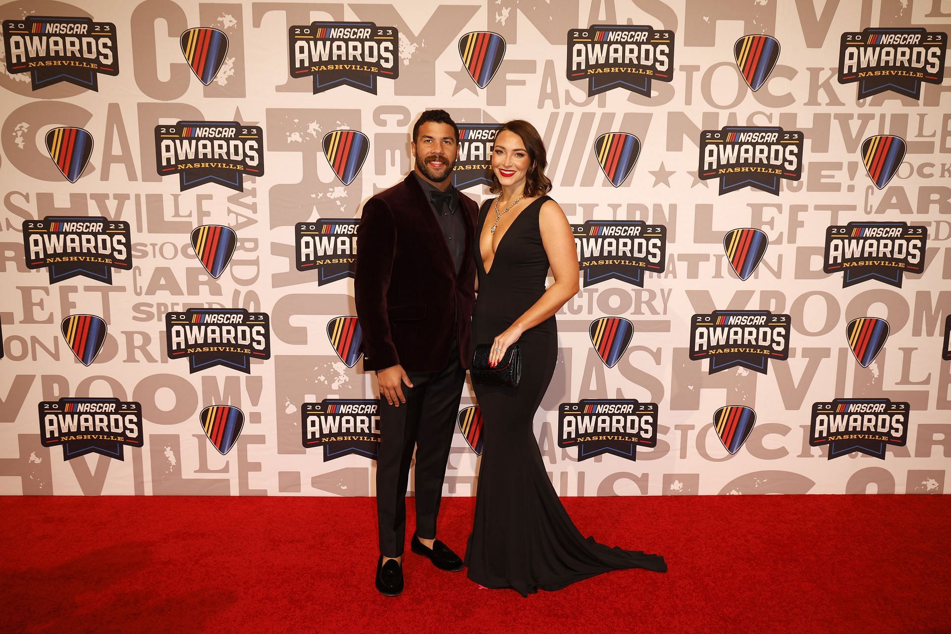 Bubba Wallace (R) and his wife, Amanda Wallace pose for photos on the red carpet - Source: Getty Images