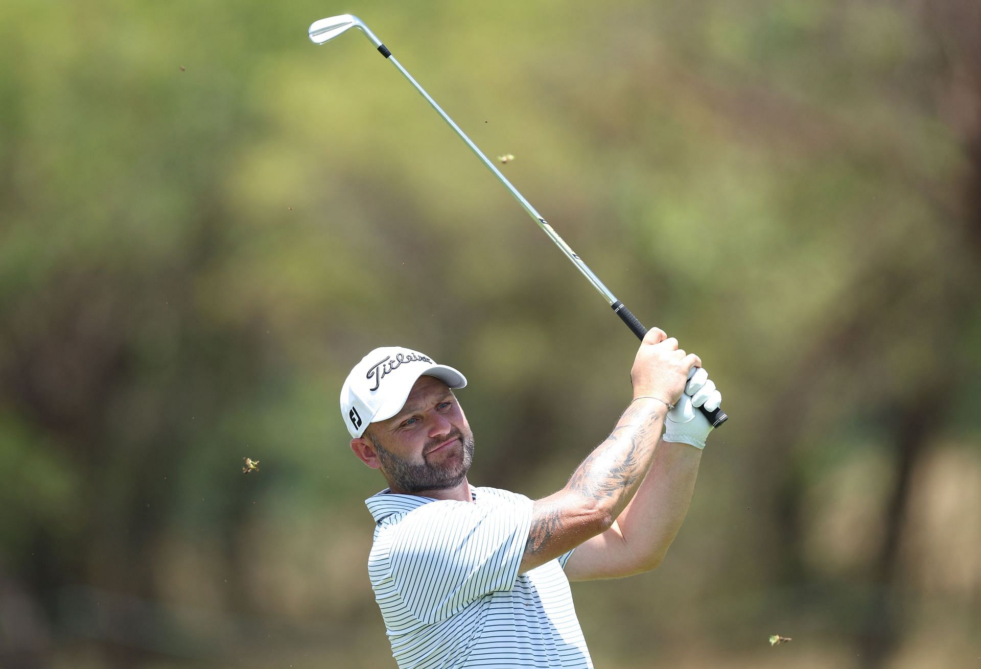 Who is leading the 2024 Alfred Dunhill Championship after round 1