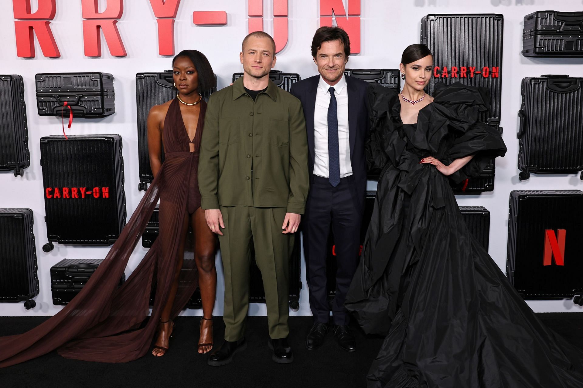 The cast of Netflix&#039;s Carry-On at the premiere of the movie in Los Angeles (Image via Getty)