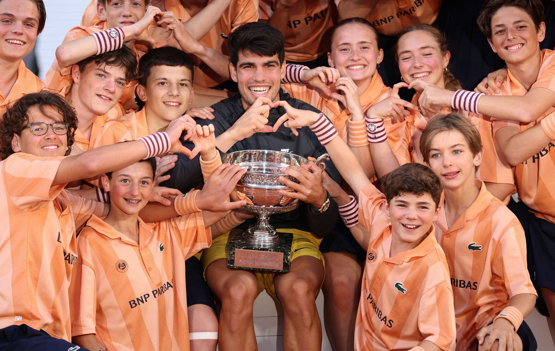 Carlos Alcaraz celebrating his 2024 French Open title with ball kids (Image: Getty)