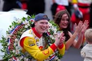 <a href='https://www.sportskeeda.com/player/josef-newgarden' target='_blank' rel='noopener noreferrer'>Josef Newgarden</a> with his wife and child at the 108th Running of the Indy 500 - Source: Getty