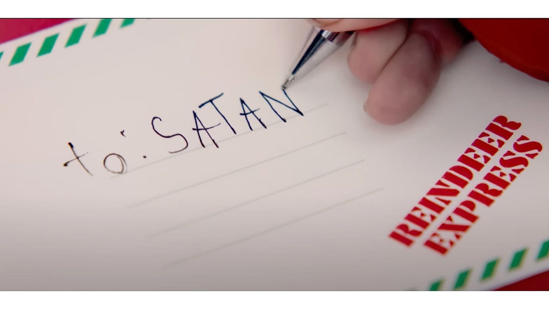 Liam accidentally misspells Santa as Satan (Image via YouTube/Paramount Movies)