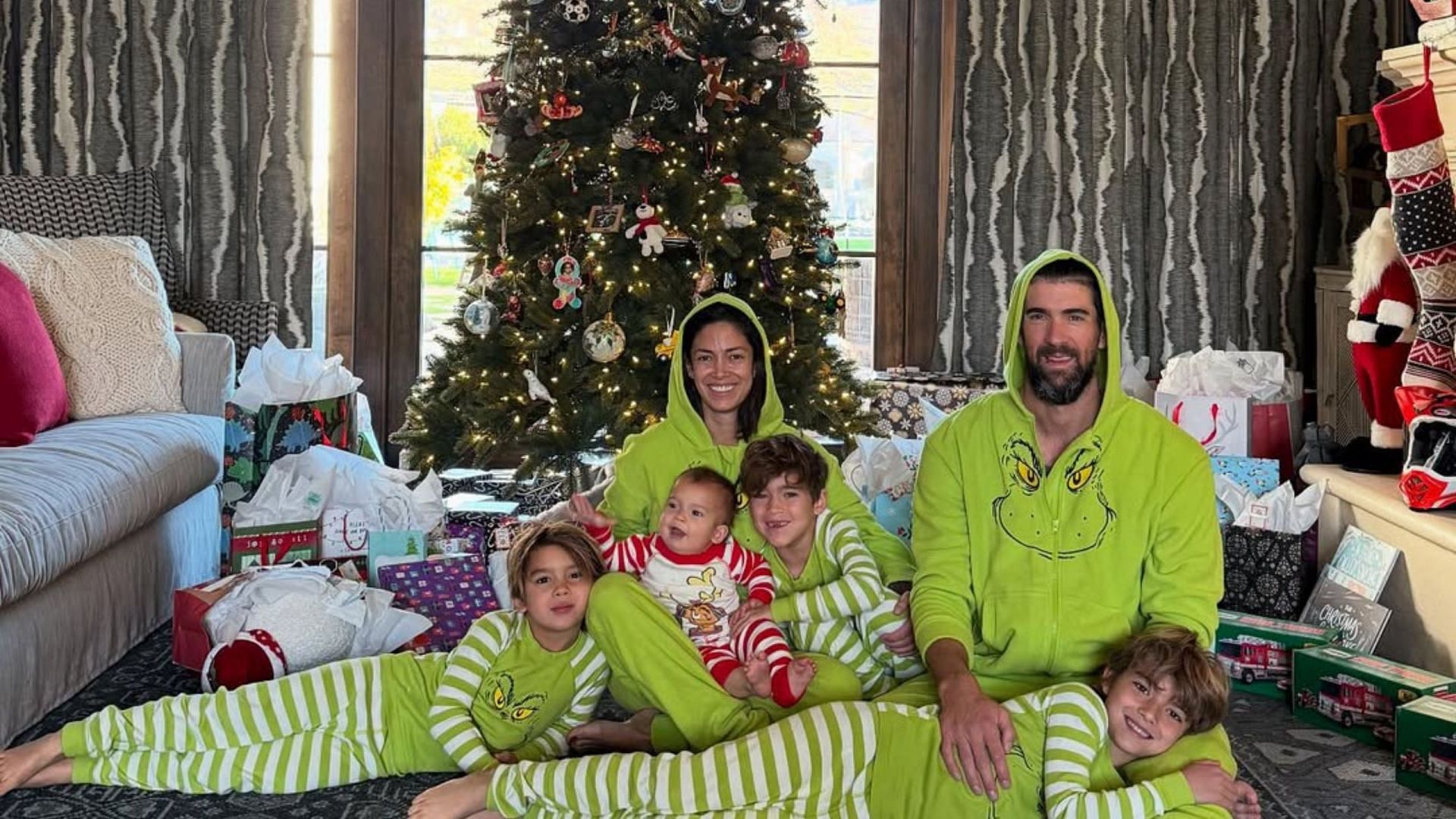 Michael Phelps and wife Nicole share glimpse in Grinch outfits as they extend wishes for Christmas [Image Source : Nicole Phelps