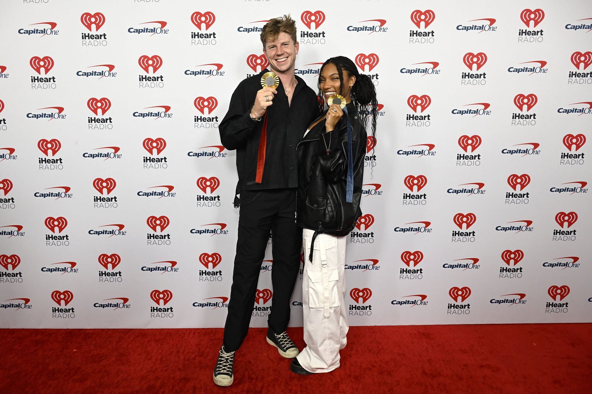 Tara Davis-Woodhall and her husband at the 2024 iHeartRadio Music Festival - Night 1 - Arrivals - Source: Getty