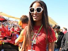 Gabby Thomas suits up with a selfie during holiday season