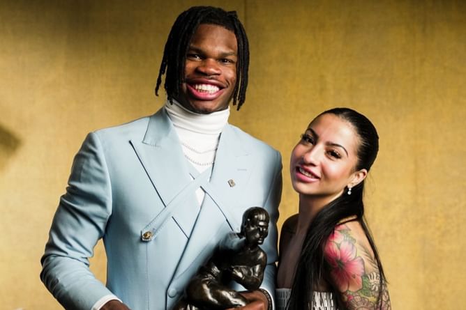 Travis Hunter drops cryptic caption as he posts a glamorous picture of his fiancée Leanna Lenne amid ongoing controversy