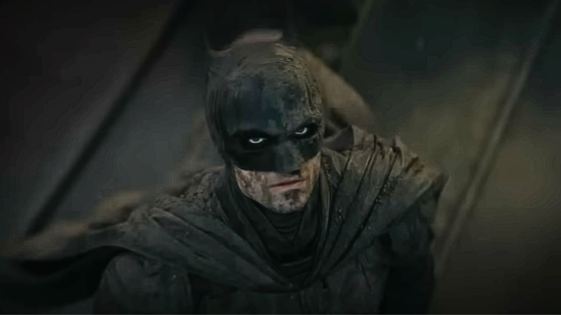 Robert Pattinson in and as The Batman (Image via YouTube/Warner Bros. Pictures) 