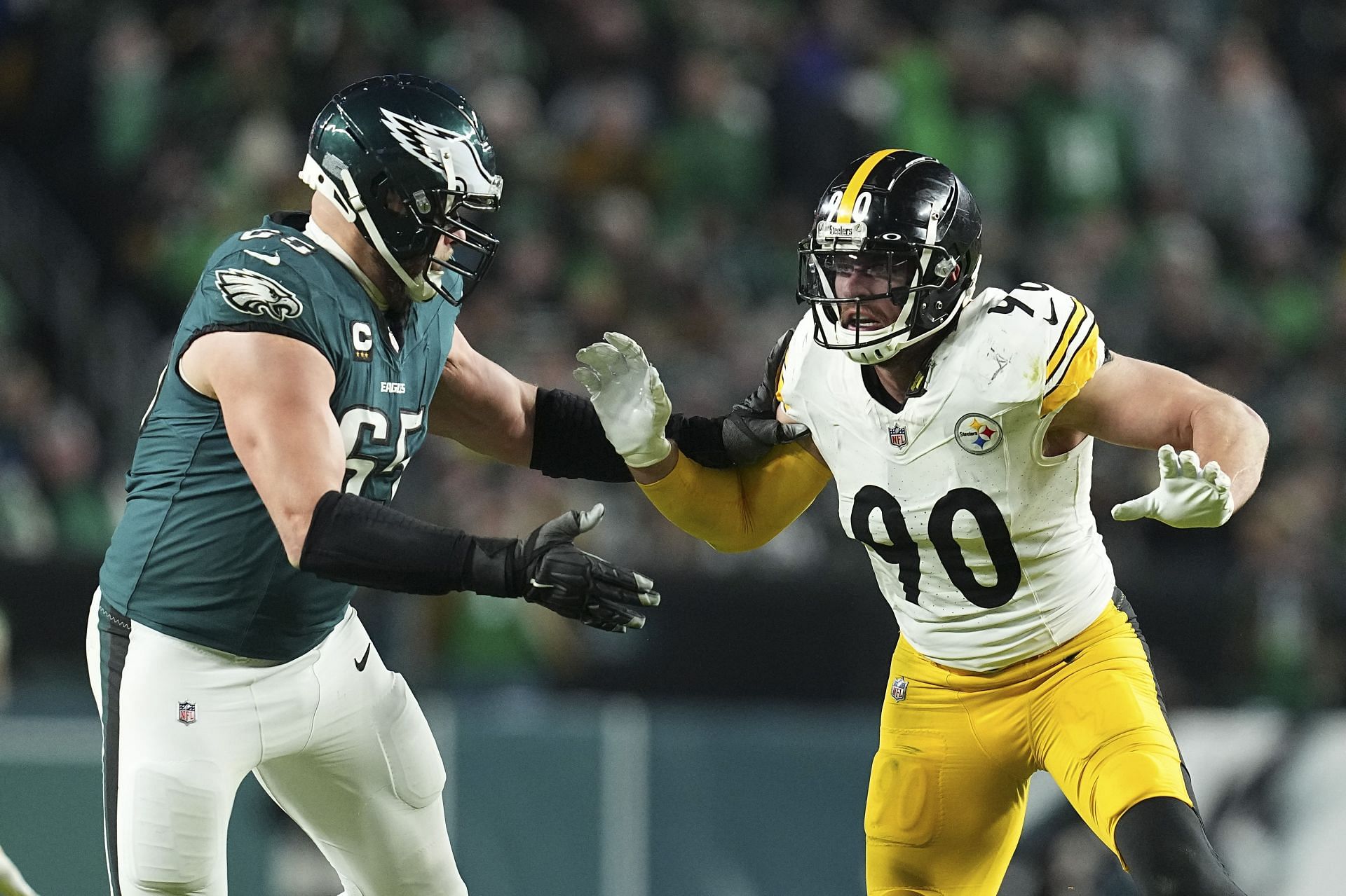 T.J. Watt #90 of the Pittsburgh Steelers rushes the passer against Lane Johnson #65 of the Philadelphia Eagles. (Credits: Getty)