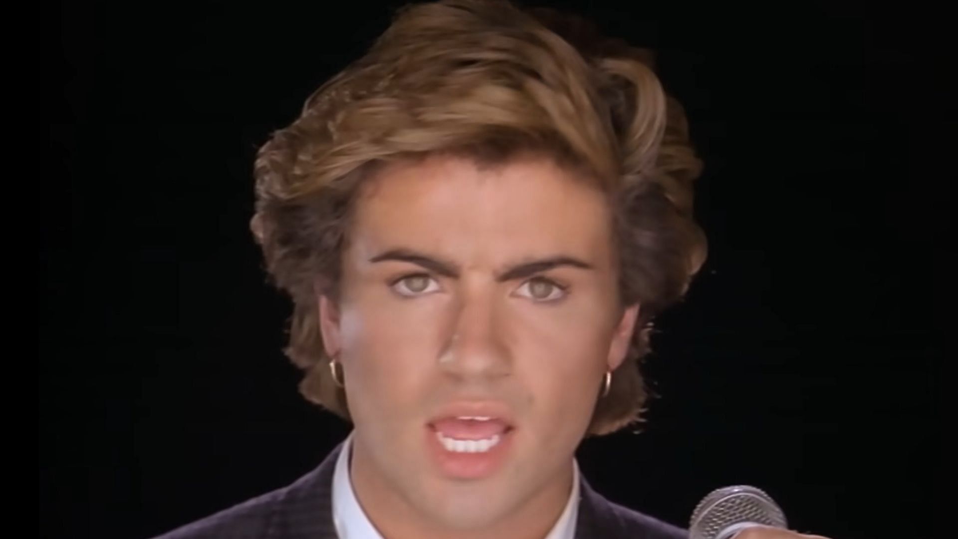 Still from Careless Whisper (Image via YouTube/georgemichael)