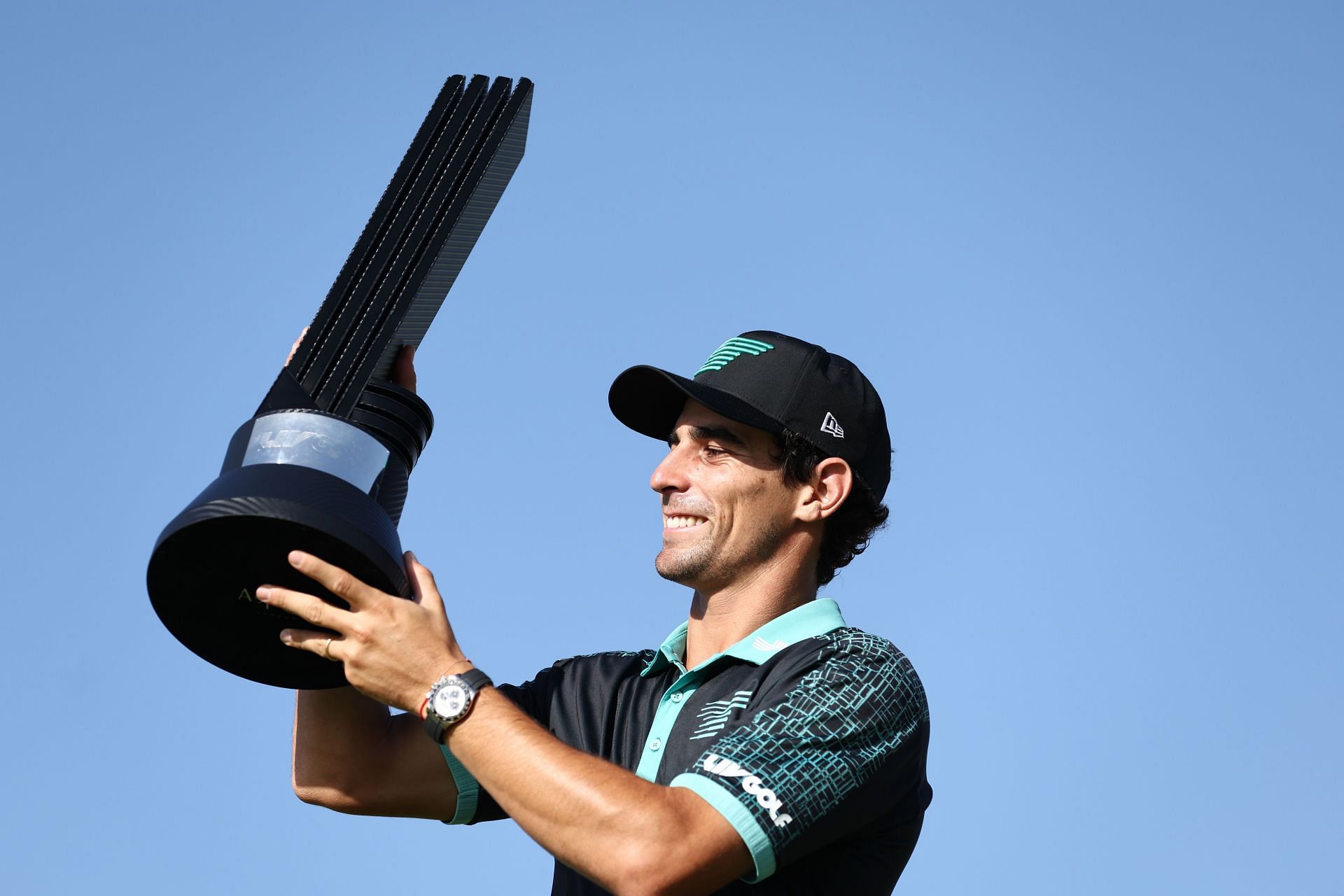 Joaquin Niemann poses for a photo with his trophy after winning the LIV Golf Jeddah (Image Source: Getty)